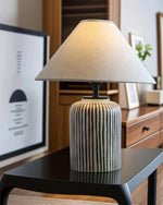 Load image into Gallery viewer, Brenton Striped Table Lamp – Hand-Painted Ceramic, Rustic Elegance | Chal Decoration

This highlights the lamp’s textured ceramic craftsmanship, timeless striped design, and warm, inviting ambiance.
