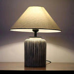 Load image into Gallery viewer, Brenton Striped Table Lamp – Hand-Painted Ceramic, Rustic Elegance | Chal Decoration

This highlights the lamp’s textured ceramic craftsmanship, timeless striped design, and warm, inviting ambiance.
