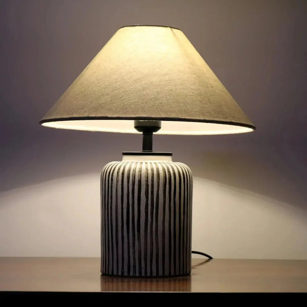 Brenton Striped Table Lamp – Hand-Painted Ceramic, Rustic Elegance | Chal Decoration

This highlights the lamp’s textured ceramic craftsmanship, timeless striped design, and warm, inviting ambiance.