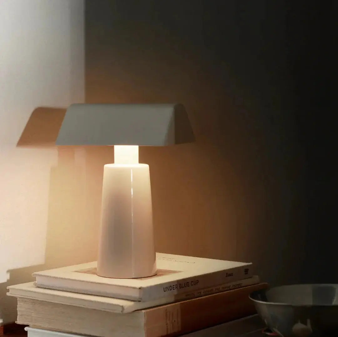 Carat Table Lamp – Wireless & Rechargeable, Geometric Elegance | Chal Decoration

This highlights the lamp’s modern functionality, unique geometric design, and versatility, emphasizing its stylish and portable appeal.