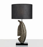 Load image into Gallery viewer, Cayo Table Lamp – Gold Feather &amp; Black Marble, Luxurious Elegance | Chal Decoration

This highlights the lamp’s intricate details, premium materials, and warm, sophisticated ambiance, making it ideal for luxury settings.
