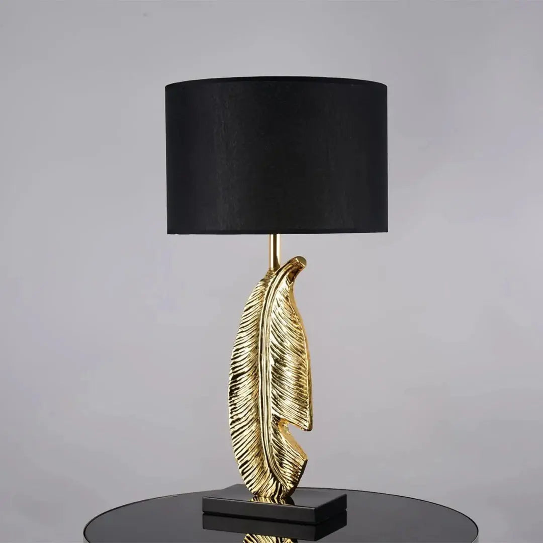 Cayo Table Lamp – Gold Feather & Black Marble, Luxurious Elegance | Chal Decoration

This highlights the lamp’s intricate details, premium materials, and warm, sophisticated ambiance, making it ideal for luxury settings.