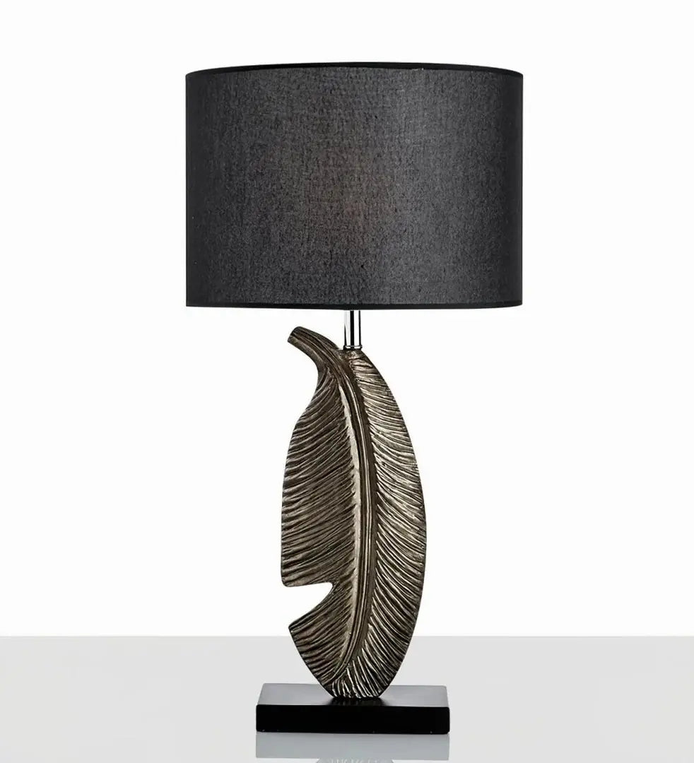 Cayo Table Lamp – Gold Feather & Black Marble, Luxurious Elegance | Chal Decoration

This highlights the lamp’s intricate details, premium materials, and warm, sophisticated ambiance, making it ideal for luxury settings.