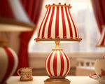 Load image into Gallery viewer, Circus-Themed Table Lamp – Red and White Stripes, Playful and Nostalgic Design | Chal Decoration

This highlights the lamp&#39;s vibrant, carnival-inspired design, blending nostalgia and modern elegance, while emphasizing its joyful and energetic atmosphere.
