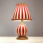 Load image into Gallery viewer, Circus-Themed Table Lamp – Red and White Stripes, Playful and Nostalgic Design | Chal Decoration

This highlights the lamp&#39;s vibrant, carnival-inspired design, blending nostalgia and modern elegance, while emphasizing its joyful and energetic atmosphere.
