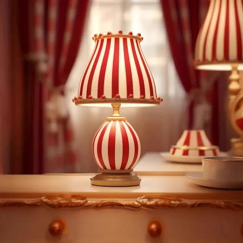 Circus-Themed Table Lamp – Red and White Stripes, Playful and Nostalgic Design | Chal Decoration

This highlights the lamp's vibrant, carnival-inspired design, blending nostalgia and modern elegance, while emphasizing its joyful and energetic atmosphere.