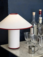 Load image into Gallery viewer, Colette Table Lamp – Conical Fabric Shade, Contemporary Vintage Charm | Chal Decoration

This highlights the lamp’s blend of modern and vintage aesthetics, emphasizing its warm illumination and stylish, balanced design.
