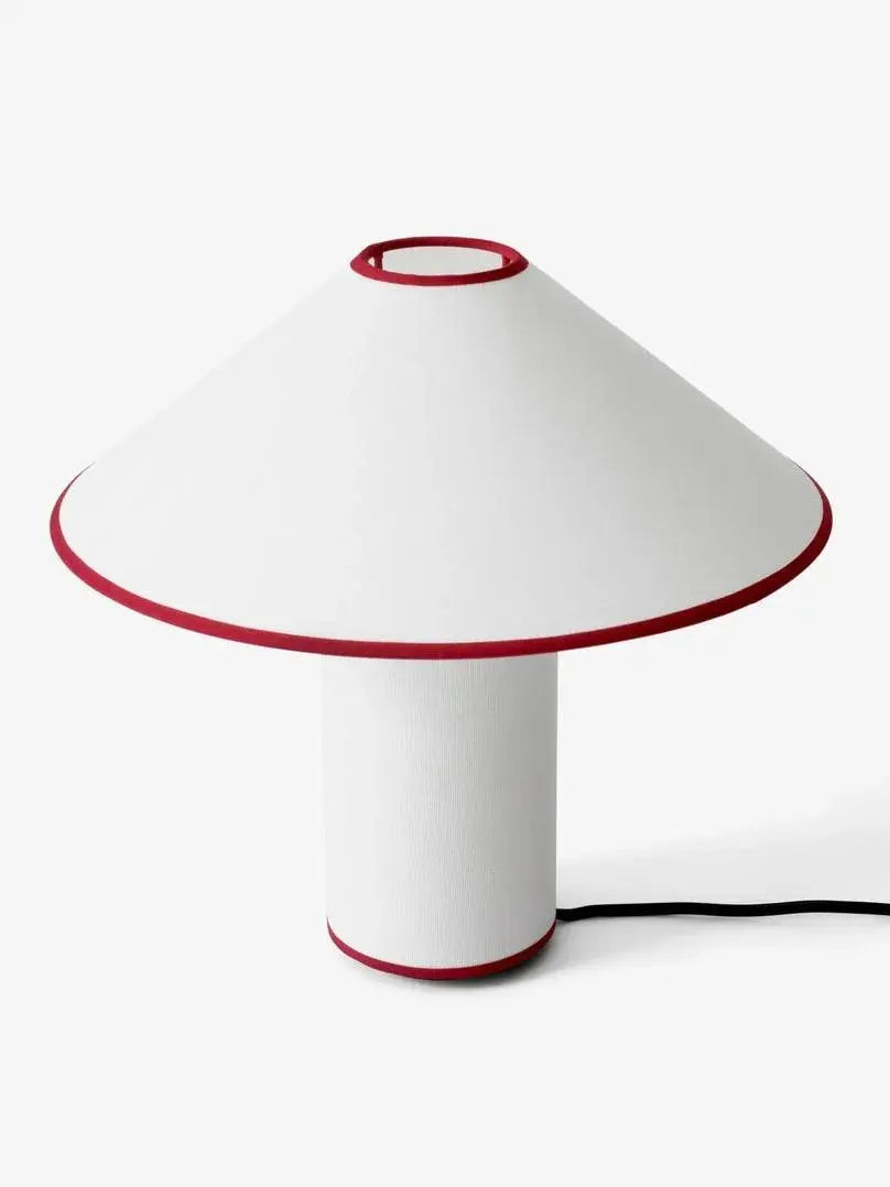 Colette Table Lamp – Conical Fabric Shade, Contemporary Vintage Charm | Chal Decoration

This highlights the lamp’s blend of modern and vintage aesthetics, emphasizing its warm illumination and stylish, balanced design.