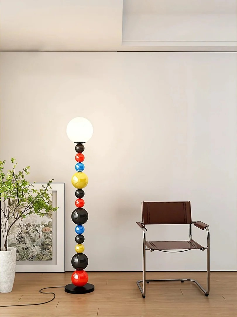 This highlights the lamp’s vibrant colors, playful aesthetic, and modern elegance, emphasizing its ability to transform any space with energy and style.