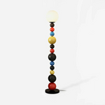 Load image into Gallery viewer, This highlights the lamp’s vibrant colors, playful aesthetic, and modern elegance, emphasizing its ability to transform any space with energy and style.
