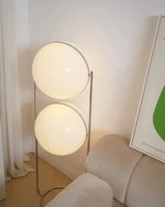 Load image into Gallery viewer, This emphasizes the sleek chrome frame and the futuristic design of the floating orbs, highlighting the lamp&#39;s modern and stylish appeal.
