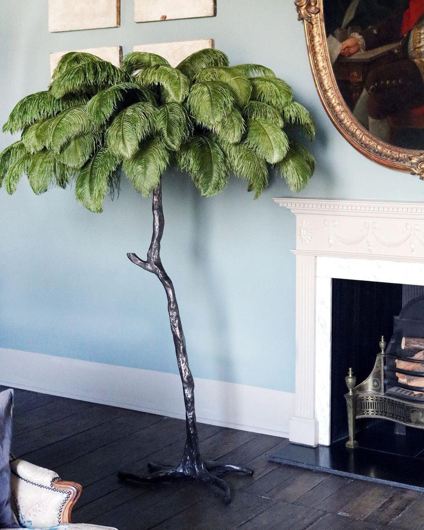 green Ostrich Feather Brass Floor Lamp in a living room