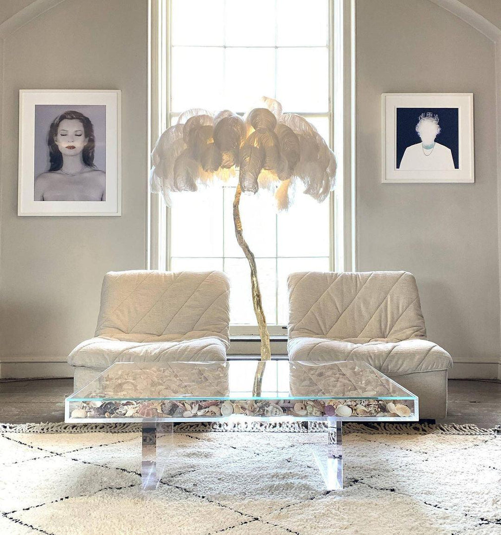 white Ostrich Feather Brass Floor Lamp in a living room