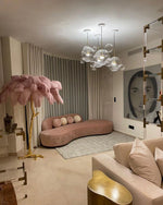 Load image into Gallery viewer, pink Ostrich Feather Brass Floor Lamp in a living room
