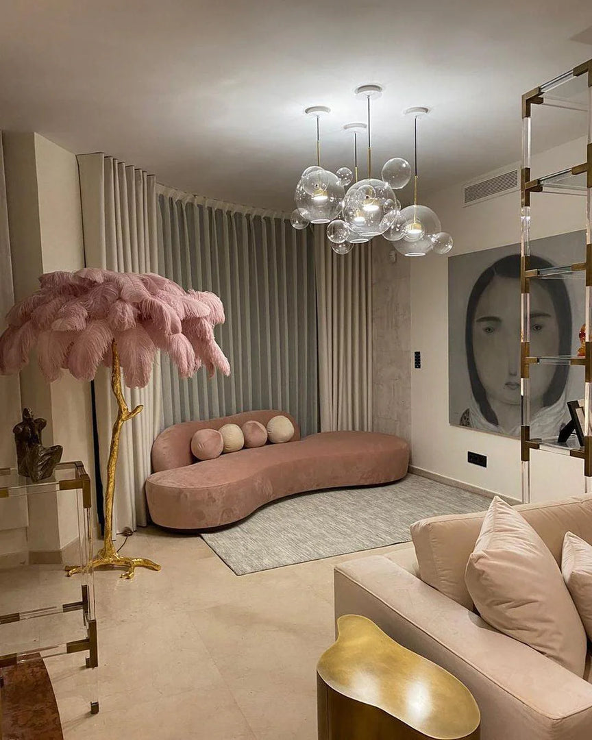 pink Ostrich Feather Brass Floor Lamp in a living room