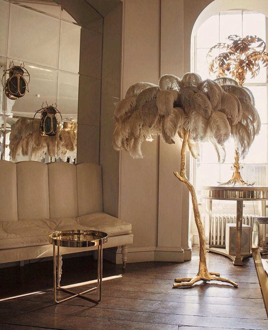 beige Ostrich Feather Brass Floor Lamp in a living room