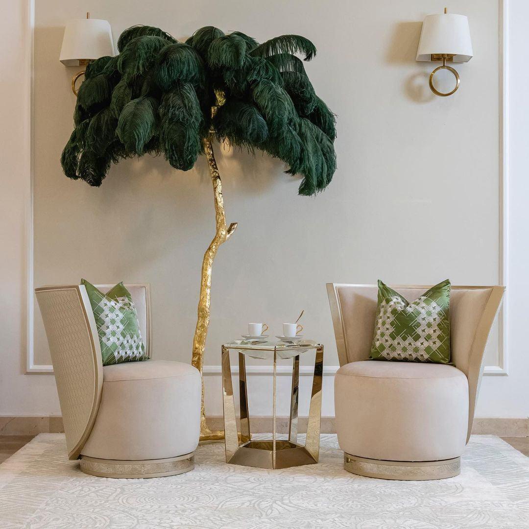 green Ostrich Feather Brass Floor Lamp in a living room