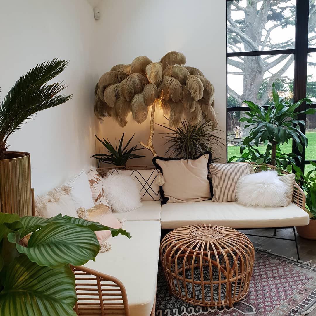 beige Ostrich Feather Brass Floor Lamp in a living room