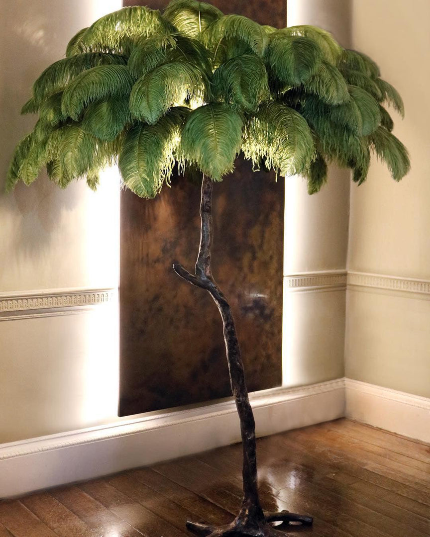 green Ostrich Feather Brass Floor Lamp in a living room