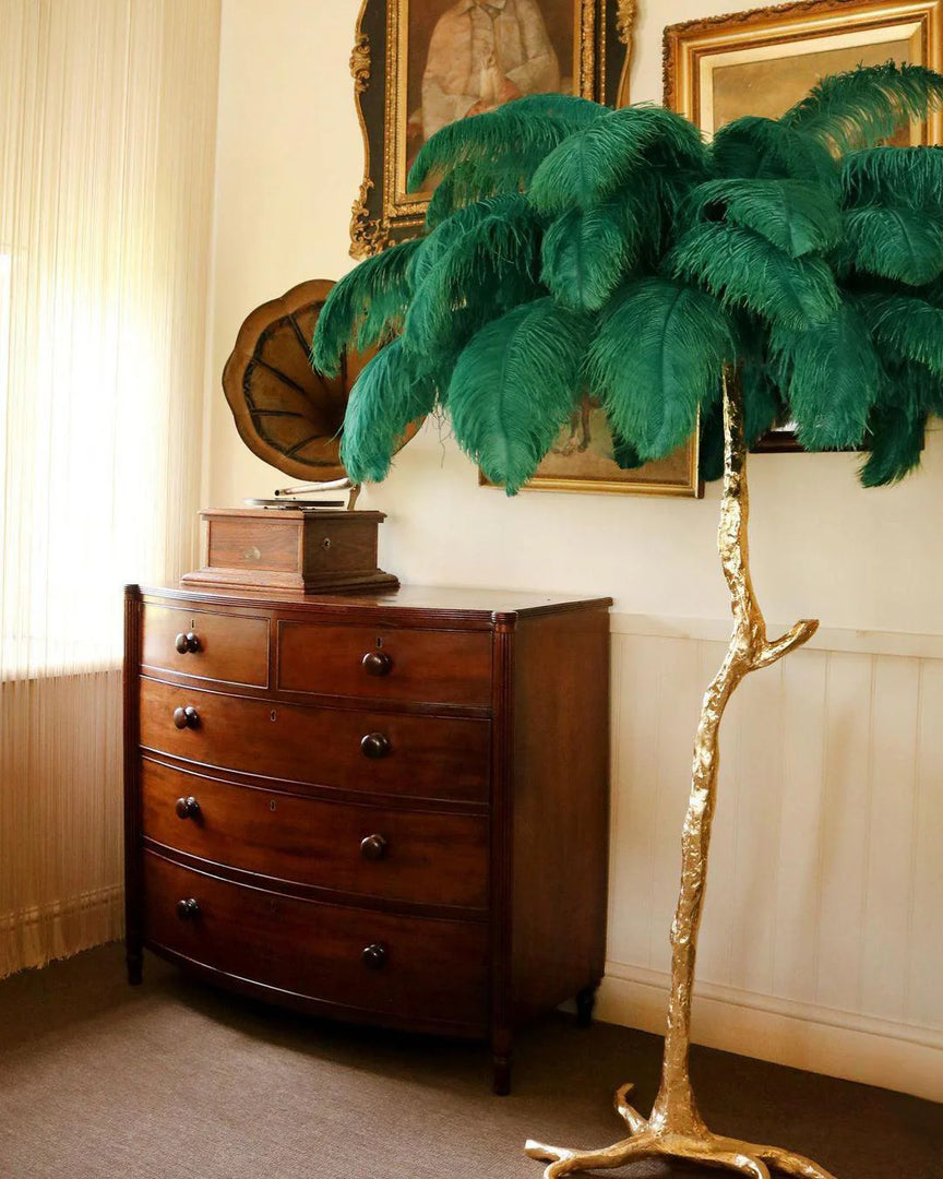 green Ostrich Feather Brass Floor Lamp in a living room