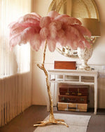 Load image into Gallery viewer, pink Ostrich Feather Brass Floor Lamp in a living room
