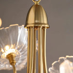 Load image into Gallery viewer, Close-up of the Oleander floral chandelier showing its elegant gold fixture and delicate, clear glass flower-shaped shade, highlighting the craftsmanship and luxurious design. Pendant Lamp
