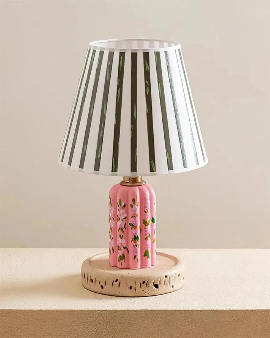 Ollie Flowers Table Lamp – Hand-Painted Floral Design, Textured Base | Chal Decoration

This highlights the lamp’s artistic floral design, stable base, and decorative appeal, emphasizing its vibrant and elegant contribution to any space.