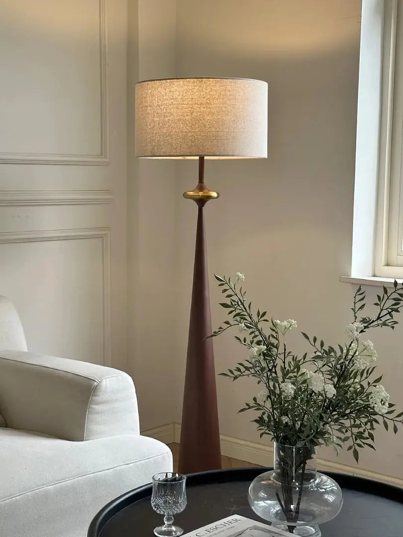 This highlights the materials (antique-finished aluminum) and the unique geometric design, while emphasizing the lamp’s ability to elevate the style and atmosphere of any room.