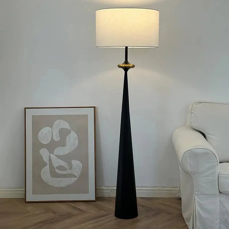 This highlights the materials (antique-finished aluminum) and the unique geometric design, while emphasizing the lamp’s ability to elevate the style and atmosphere of any room.