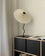 Load image into Gallery viewer, Squiggle Table Lamp – Origami-Folded Shade, Modern &amp; Sophisticated Design | Chal Decoration

This highlights the lamp’s unique folded design, wavy base, and its blend of contemporary elegance with strong personality.
