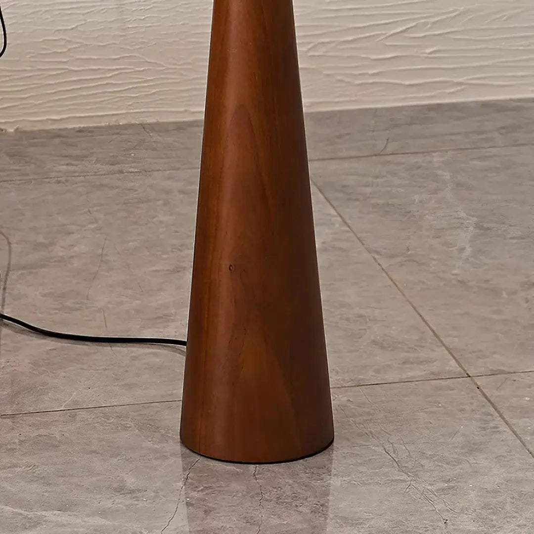 This highlights the lamp’s sleek wooden design and minimalist sophistication, emphasizing its warmth and contemporary appeal.