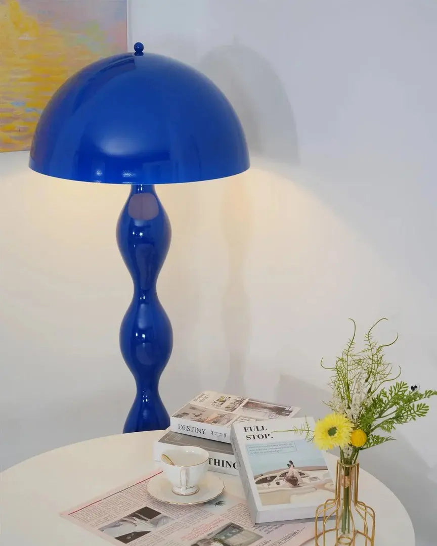 This highlights the lamp's flowing design and vibrant colors, while emphasizing its ability to create a serene and sophisticated atmosphere.