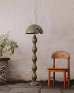 Load image into Gallery viewer, This highlights the lamp&#39;s flowing design and vibrant colors, while emphasizing its ability to create a serene and sophisticated atmosphere.
