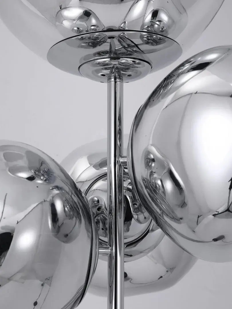 This highlights the lamp’s unique blown glass construction and its modern, optical effect, emphasizing its artistic and sophisticated appeal.