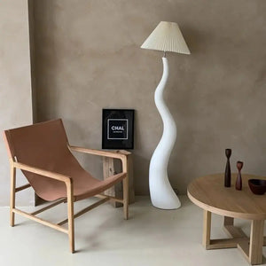 This emphasizes both the key material (solid wood) and the unique style/feature (handcrafted design) while maintaining a focus on the aesthetic and use of the lamp in home decoration.