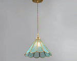 Load image into Gallery viewer, Butterfly pendant lamp with a blue stained glass scalloped shade and gold metal frame, suspended by a twisted cord and brass ceiling mount, adding a vintage and sophisticated ambiance to the decor.
