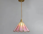 Load image into Gallery viewer, Butterfly pendant lamp with a pink stained glass scalloped shade and gold metal frame, suspended by a twisted cord and brass ceiling mount, adding a vintage and elegant touch to the space.
