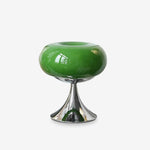 Load image into Gallery viewer, Candle table lamp with a vibrant green glass dome-shaped shade and polished chrome base, showcased against a plain white background to highlight its modern and sleek design.
