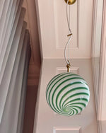 Load image into Gallery viewer, Candy pendant lamp with green and white swirl pattern, perfect for adding a whimsical yet stylish touch to any interior.
