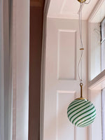 Load image into Gallery viewer, Candy pendant lamp with a vibrant green and white spiral design, bringing playful elegance and a fresh look to any space.
