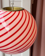 Load image into Gallery viewer, Candy pendant lamp with red and white swirl design, perfect for adding a playful and modern touch to any room with its vibrant and eye-catching pattern.
