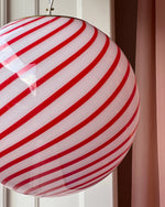 Load image into Gallery viewer, This beautiful Candy pendant lamp features a striking red and white swirl pattern, adding vibrant energy and a modern touch to any room. Perfect for adding style and charm with its playful design.
