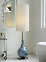 Load image into Gallery viewer, This highlights the lamp’s coastal charm, versatile design, and warm, balanced lighting.
