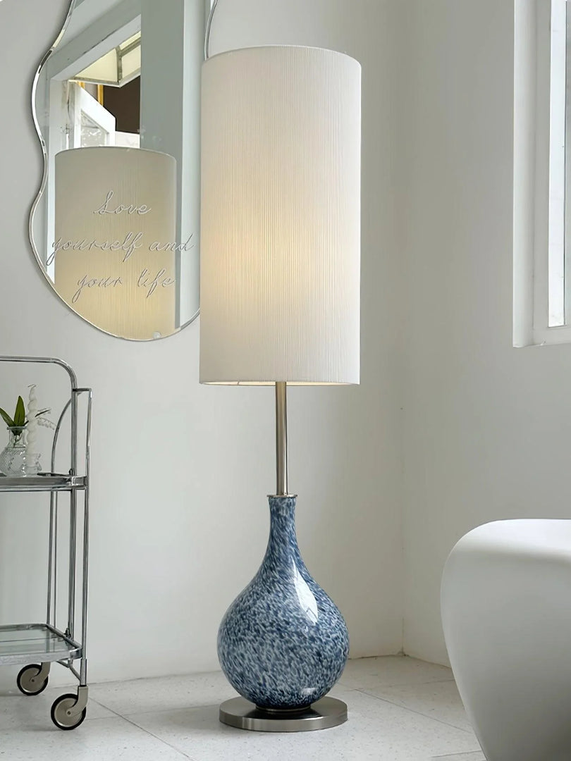 This highlights the lamp’s coastal charm, versatile design, and warm, balanced lighting.