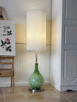 Load image into Gallery viewer, This highlights the lamp’s coastal charm, versatile design, and warm, balanced lighting.
