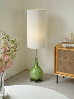 Load image into Gallery viewer, This highlights the lamp’s coastal charm, versatile design, and warm, balanced lighting.
