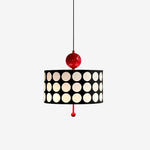 Load image into Gallery viewer, Sleek Metal Lattice Pendant Lamp featuring a black shade with large white circular patterns and bright red accents, displayed against a plain background for a minimalistic, modern look.
