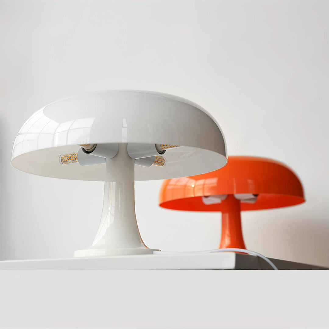 Cream and orange Mushroom Playful Table Lamps juxtaposed to highlight their glossy finishes and curvaceous designs, the two tones playing off each other to enhance the visual appeal in a minimalist setting, perfect for modern interiors.