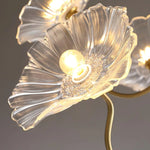 Load image into Gallery viewer, A close-up view of the pendant lamp’s crystal-clear floral shade, showcasing intricate petal-like detailing that diffuses the light from the central bulb beautifully. The golden accents and shimmering textures add a refined elegance, making it a standout feature in any interior decor.
