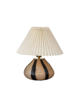 Load image into Gallery viewer, Pleated Cavolo table lamp with a striped ceramic base and cream pleated shade, isolated on a transparent background to highlight its elegant design.
